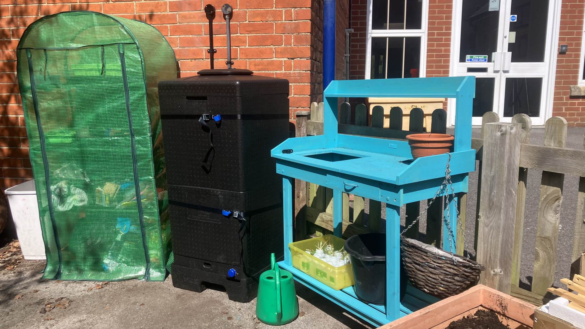 Our planting area with Hotbin composter